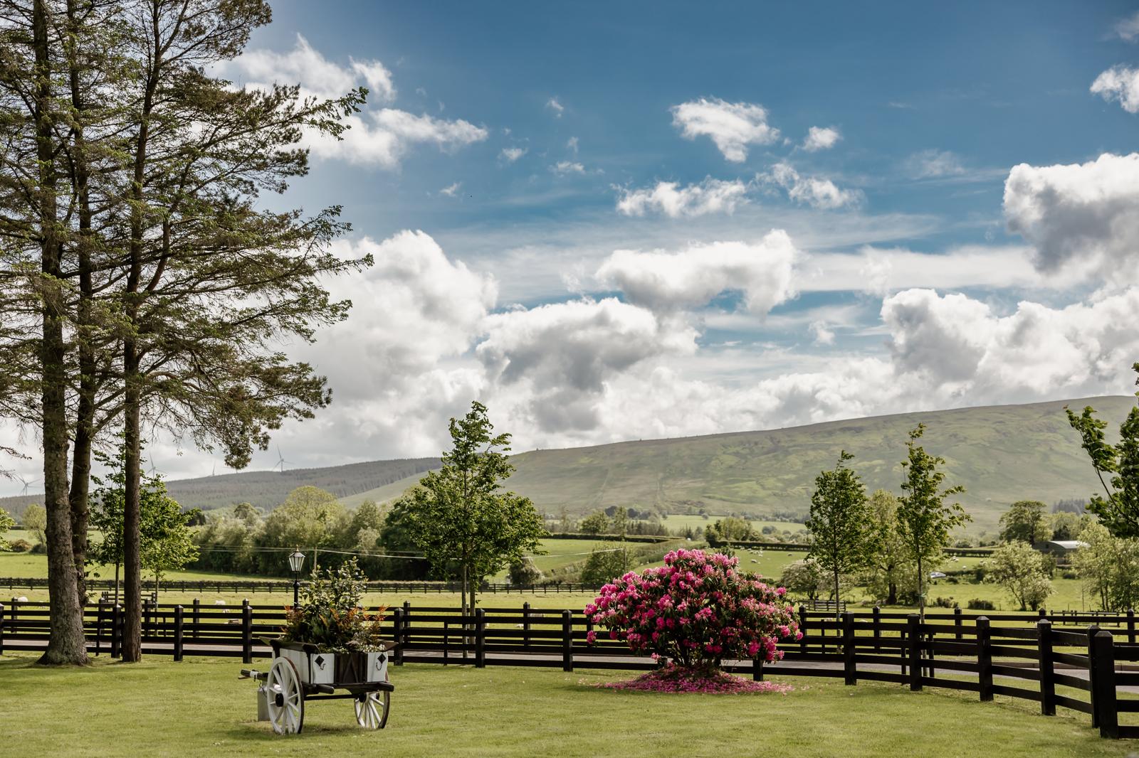 Shepherd's huts with patio and fire pit at Ballyness